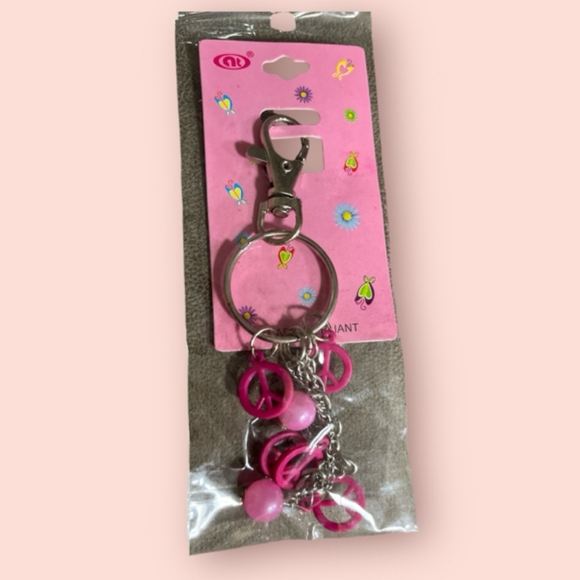 Accessories - 🥳 7/$10 CLEARANCE PRICE❣️ Peace Keychain Hot Pink